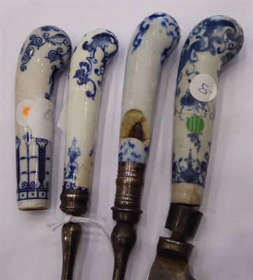 Lot 231 - A Bow Porcelain Knife Handle, circa 1760, painted in underglaze blue with scrolls and foliage,...
