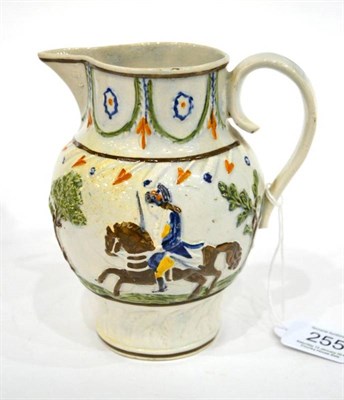 Lot 255 - A Pratt Type Jug, circa 1800, typically moulded and painted with the Duke of York, 14cm high