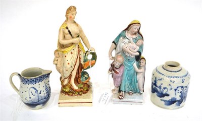 Lot 265 - A Pearlware Figure of Venus, circa 1800, standing with a dolphin and cherub on a square base,...