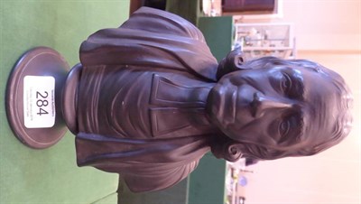 Lot 284 - A Wedgwood Black Basalt Bust of Wesley, early 19th century, on a circular socle, impressed...