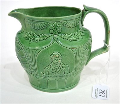 Lot 287 - A Staffordshire Green Glazed Earthenware Jug, circa 1810, moulded with a titled bust portrait...