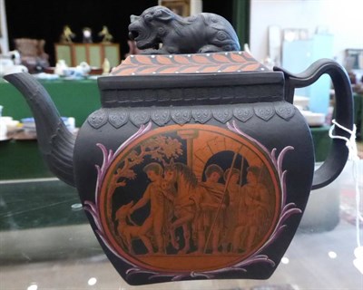 Lot 288 - A Black Basalt Teapot and Cover, circa 1810, of bombé rectangular form with recumbent lion finial