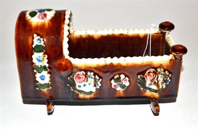 Lot 331 - A Measham Bargeware Cradle, dated 1885, of traditional form, inscribed LEAH MARY STONE 1885 and...