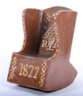 Lot 335 - A Slipware Rocking Chair, dated 1877, in the form of a lambing chair, inscribed RA 1877, 16.5cm...