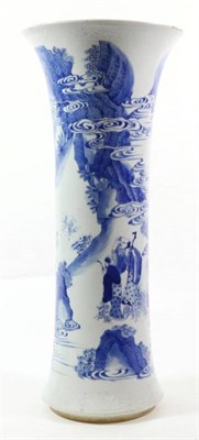 Lot 370 - A Chinese Porcelain Beaker Vase, in Kangxi style, painted in underglaze blue with figures on a...