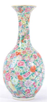 Lot 371 - A Chinese Porcelain Millefleur Bottle Vase, late 19th/20th century, with flared neck and...