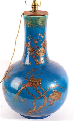 Lot 372 - A Chinese Blue Ground Bottle Vase, 19th century, with applied lappet decoration of flowering...
