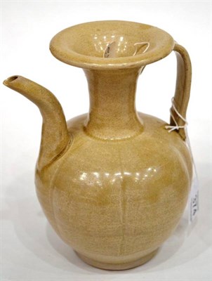 Lot 374 - A Chinese Celadon Glazed Ewer, Song Dynasty, of fluted ovoid form with flared neck, 19cm high