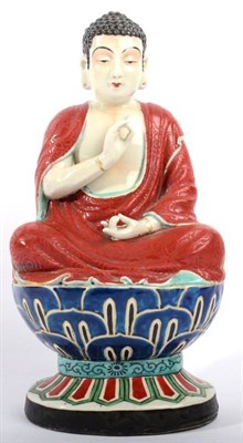 Lot 381 - A Japanese Porcelain Figure of Buddha, Meiji period, sitting on a lotus throne, 34cm high