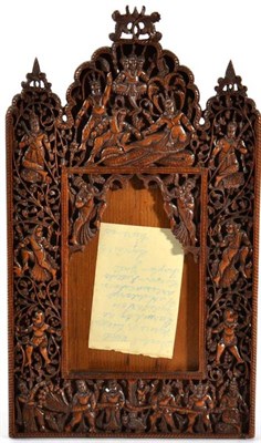 Lot 1022 - An Indian Sandalwood Photograph Frame, late 19th/early 20th century, carved and pierced with...