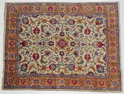 Lot 1202 - Tabriz Carpet  Iranian Azerbaijan, 20th century The ivory field of acanthus vines centred by a...