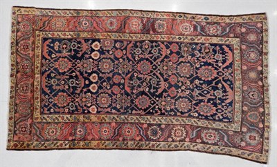 Lot 1214 - Kurdish Khelleh Carpet Iranian Kurdistan, early 20th century The indigo lattice field enclosed...