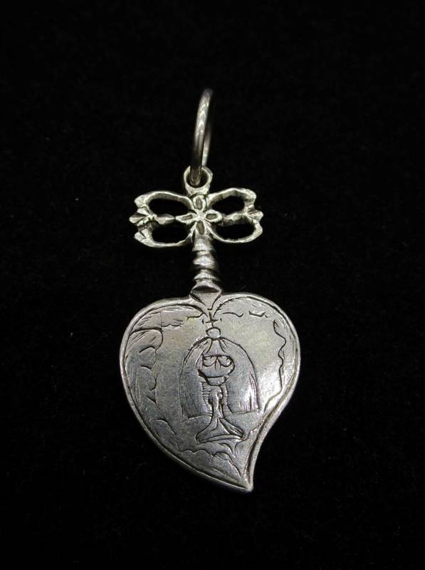 Lot 1036 - A Silver Pendant, probably English, 16th/17th century, as a sacred heart with engraved...