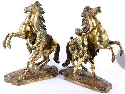 Lot 1054 - After Guillaume Coustou (1677-1746): A Pair of Gilt Bronze Marly Horses and Attendants, on...