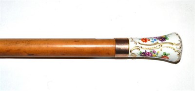 Lot 1062 - A Dresden Porcelain Mounted Malacca Cane, late 19th century, the handle painted with a...