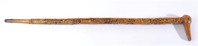 Lot 1064 - A Carved Wood Walking Stick, possibly a Welsh Love Token, 19th century, carved with a variety...