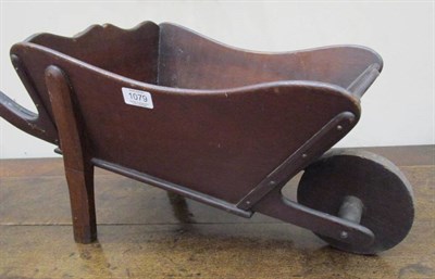 Lot 1079 - A Child's Mahogany Wheelbarrow, mid 19th century, with ogee rim and curved handles, initialled...