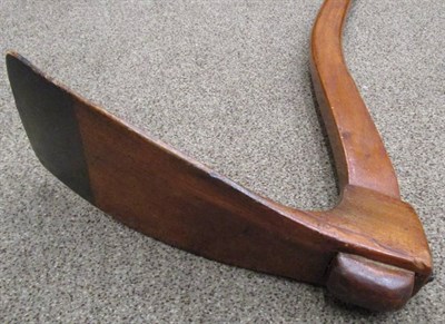 Lot 1080 - A Mahogany Shop Sign, mid 19th century, in the form of an adze, 80cm long