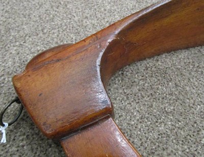 Lot 1080 - A Mahogany Shop Sign, mid 19th century, in the form of an adze, 80cm long