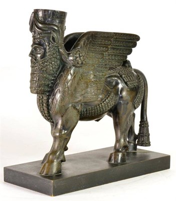 Lot 1089 - After the Antique: A Bronze Figure of Lamassu, the standing mythical winged creature on a...