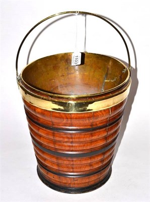 Lot 1103 - A Brass Mounted Coopered Peat Bucket, of ribbed tapering cylindrical form with overhead swing...