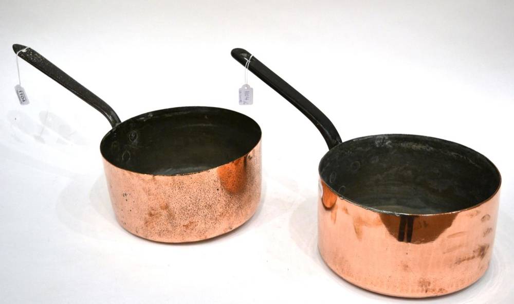 Lot 1104 - An Allez Frère, Paris Copper Sauce Pan, with iron handle, 53cm long; and Another Copper Sauce Pan