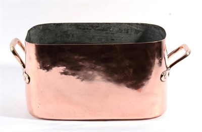 Lot 1105 - A Copper Twin-Handled Cooking Pot, 19th century, of rounded rectangular form with loop handles,...