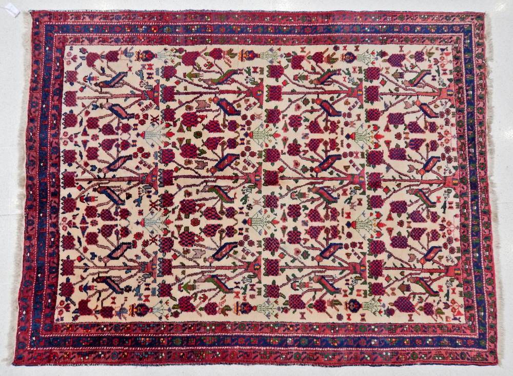 Lot 1178 - Afshar Rug South East Iran, circa 1960 The ivory field with a one way design of trees and...