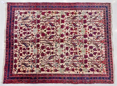 Lot 1178 - Afshar Rug South East Iran, circa 1960 The ivory field with a one way design of trees and...