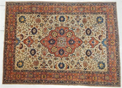 Lot 1237 - Tabriz Carpet Iranian Azerbaijan, circa 1930 The ivory field of palmettes and vines around a...