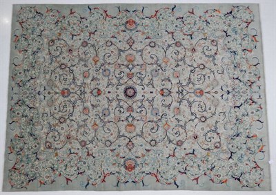 Lot 1241 - Kashan Carpet Central Iran, circa 1970 The ice blue ground with an allover design of scrolling...