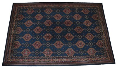 Lot 1248 - Large European Carpet of Ushak Design probably Donegal, circa 1910 The deep indigo field with...