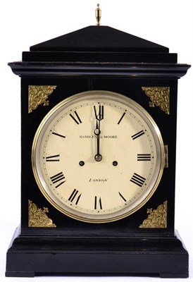 Lot 1277 - An Ebonised Striking Table Clock, circa 1820, caddy pediment, pierced sound frets, 8-inch...