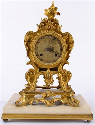 Lot 1281 - An Ormolu Striking Mantel Clock, circa 1830, scroll decorated case, 3-inch Roman numeral dial, twin