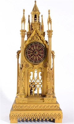 Lot 1283 - A Gothic Style Cathedral Form Striking Gilt Metal Mantel Clock, circa 1840, cathedral form case...