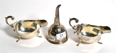Lot 21 - A George III silver wine funnel, makers mark TB or TR, London 1813; together with a pair of...