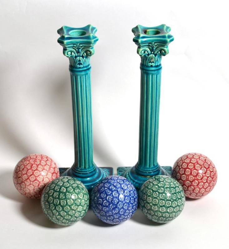 Lot 24 - A pair of Burmantoft's turquoise glaze Corinthian column candlesticks; together with five Victorian