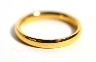 Lot 58 - An 18 carat gold band ring, finger size L1/2, 3.5g