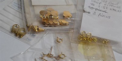 Lot 84 - A large quantity of gold jewellery findings, including clasps and earrings