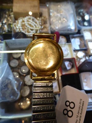 Lot 88 - A gents calendar wristwatch, signed Duward, case back stamped 18k0.750