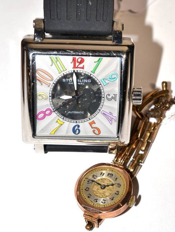 Lot 102 - An automatic square shaped wristwatch, signed Stuhrling, with box and booklet, and a lady's 9ct...