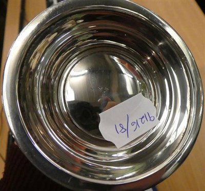 Lot 105 - A silver pint mug of George III style, Barker Brothers, Birmingham 1936, plain baluster form...