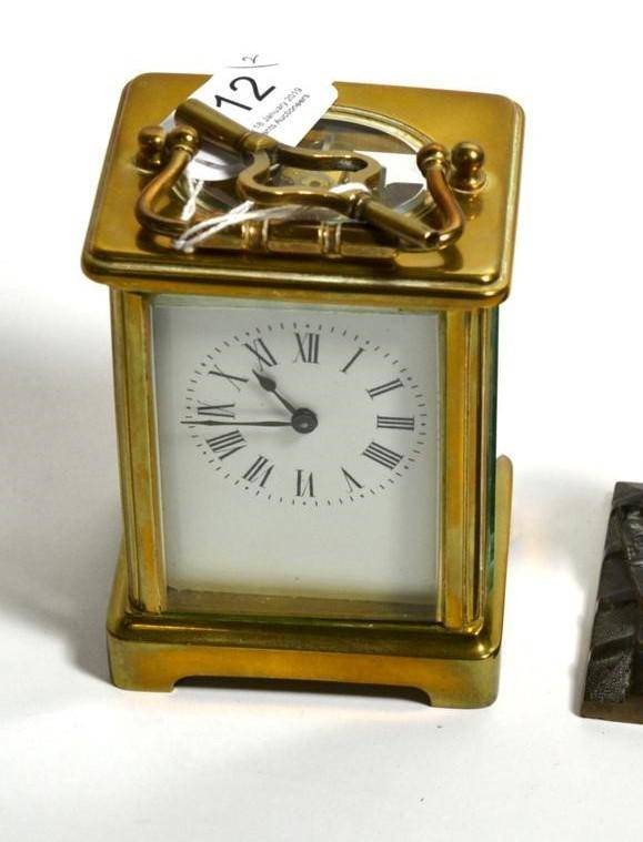 Lot 112 - A brass carriage timepiece
