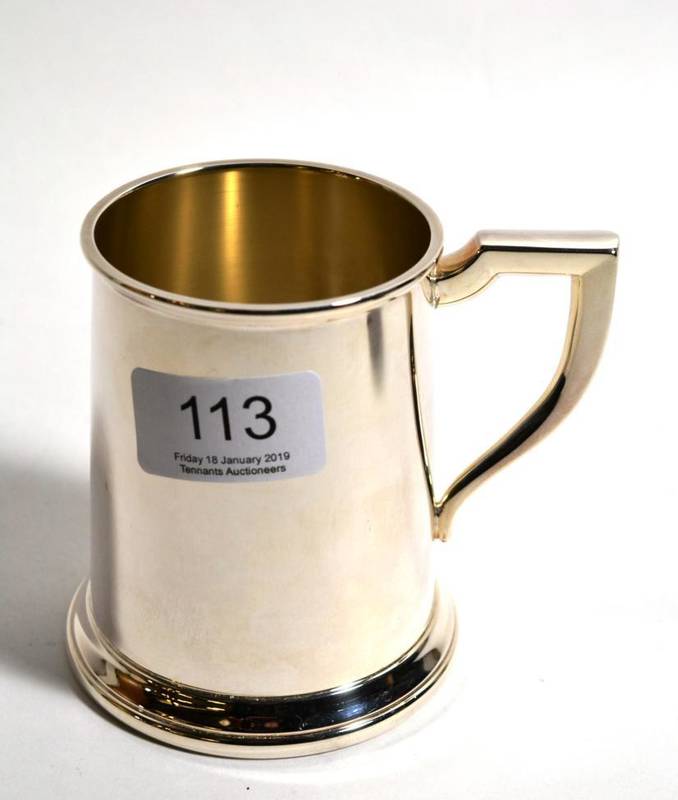 Lot 113 - A silver Christening mug, Carrs, Sheffield 2001, plain and of tapering form, 9.5cm high, 6.7ozt