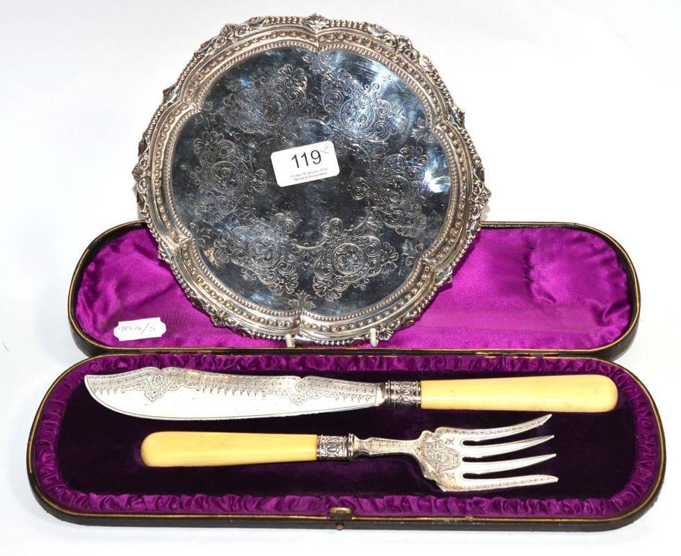 Lot 119 - A late Victorian silver salver, Goldsmiths & Silversmiths, London 1900, with decorative border...