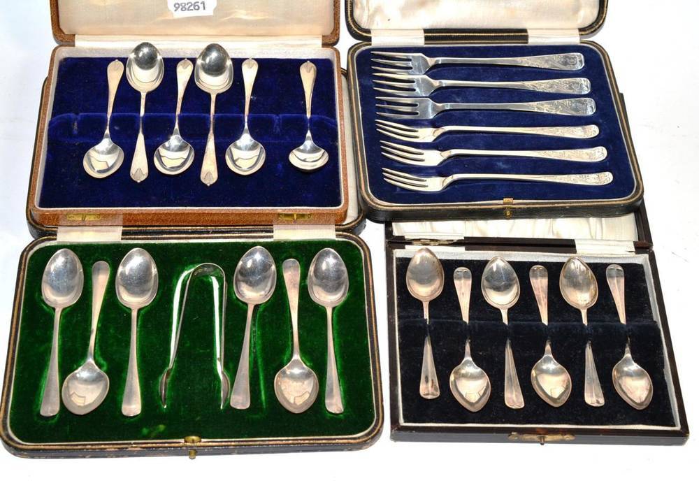 Lot 127 - Three cased sets of silver spoons and a cased set of pickle forks