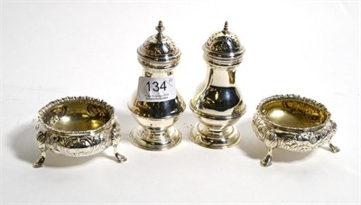 Lot 134 - A George III silver bun top caster, Alexander Johnston, London 1765; together with another...