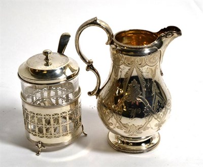 Lot 137 - A Victorian silver cream jug, George Richards & Edward Brown, London 1865, with engraved...