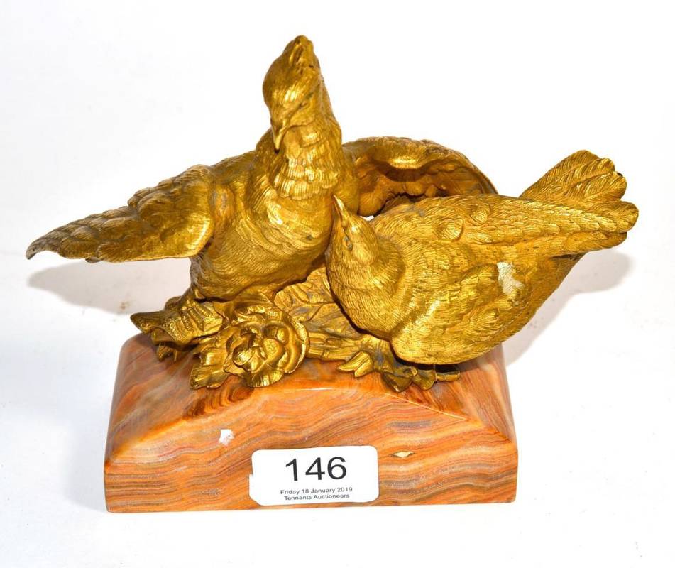 Lot 146 - A French gilt bronze group of two birds, late 19th/early 20th century, on a later marble base, 15cm