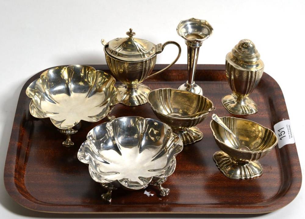 Lot 151 - A pair of silver scalloped bon bon dishes; four piece silver condiment set; and a small spill vase